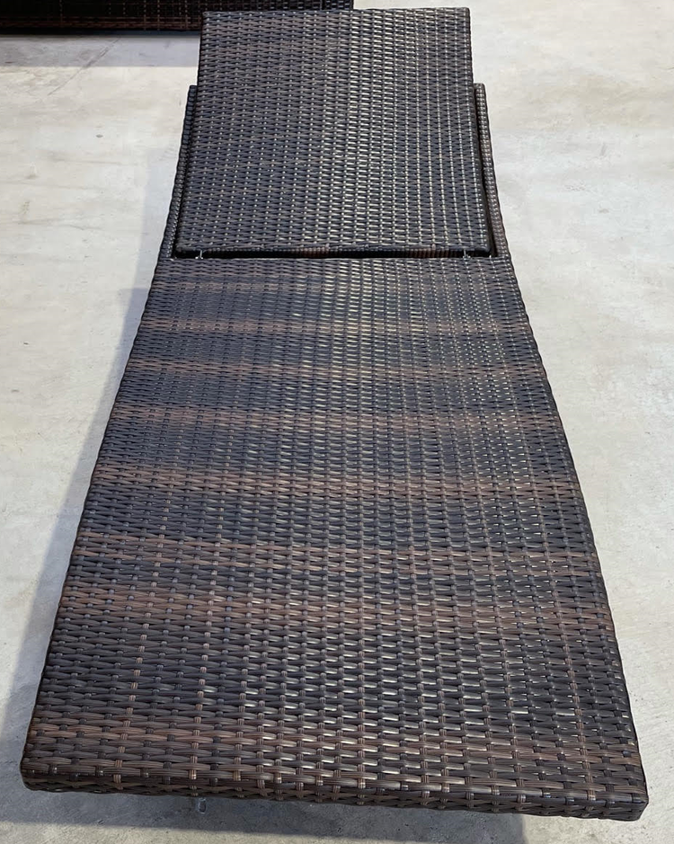 Rattan sun lounger with wheels